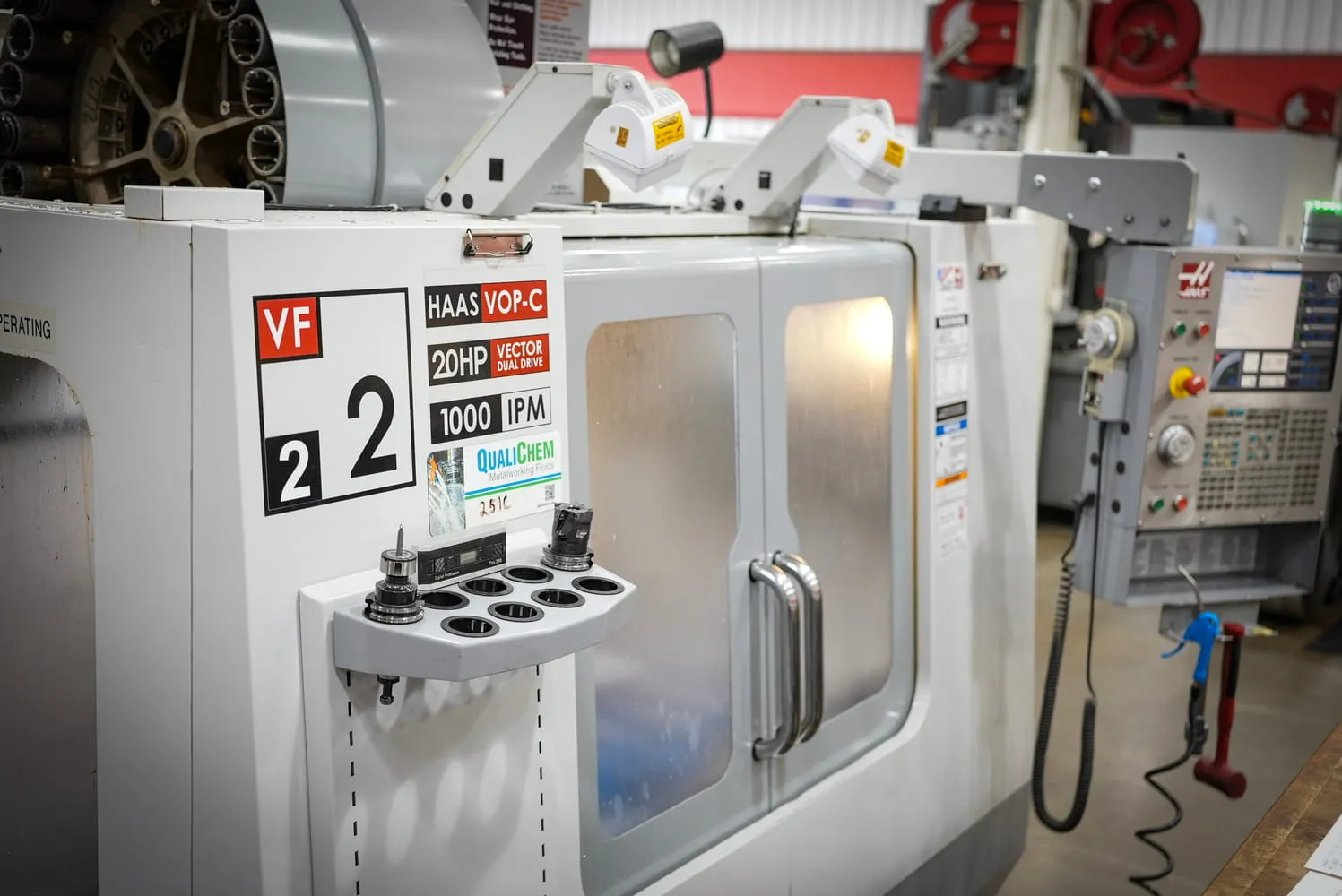 Haas VF-2 vertical machining center with tool holders at ETG facility for food-grade parts production