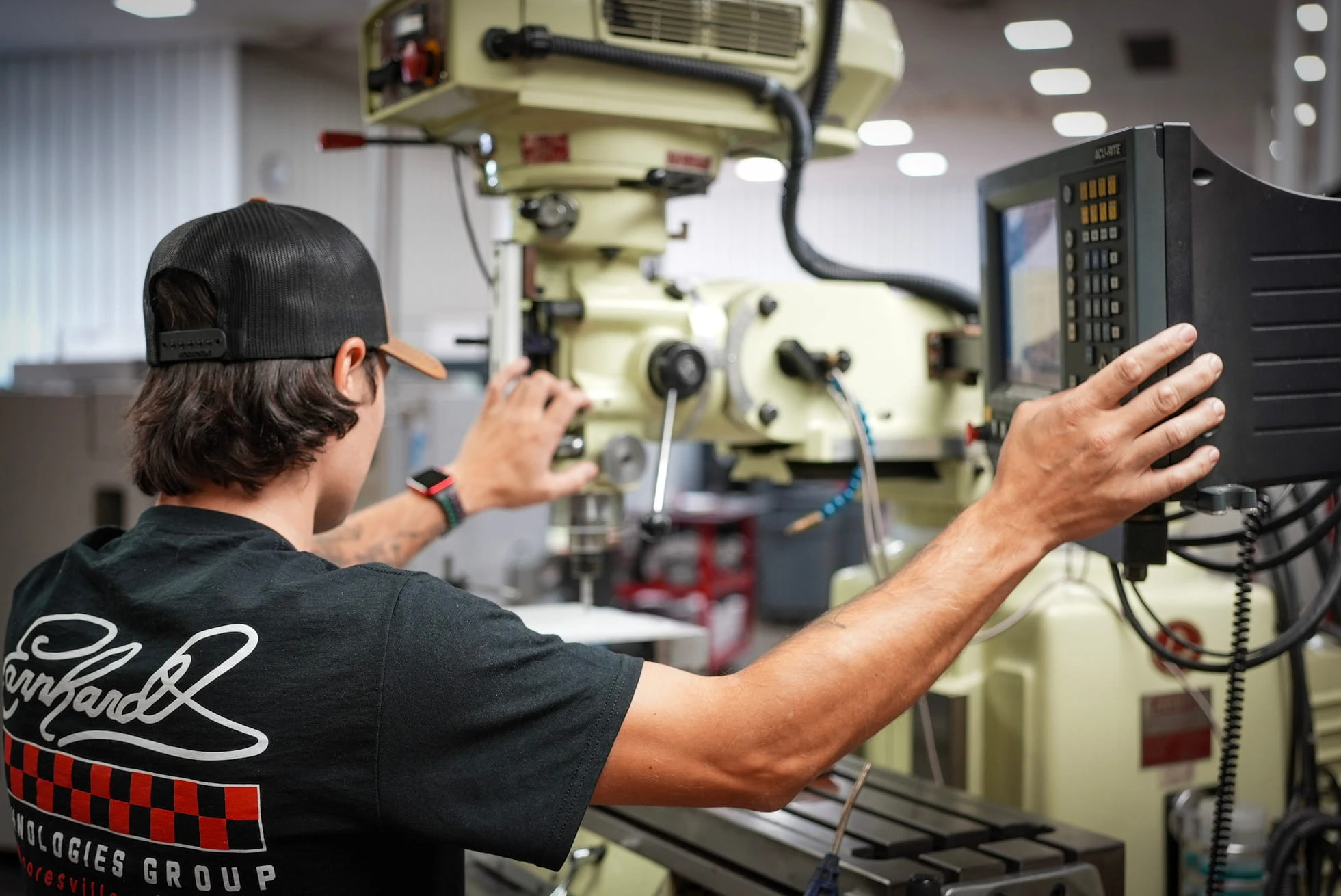 ETG machinist programming Acu-Rite digital readout on manual milling machine