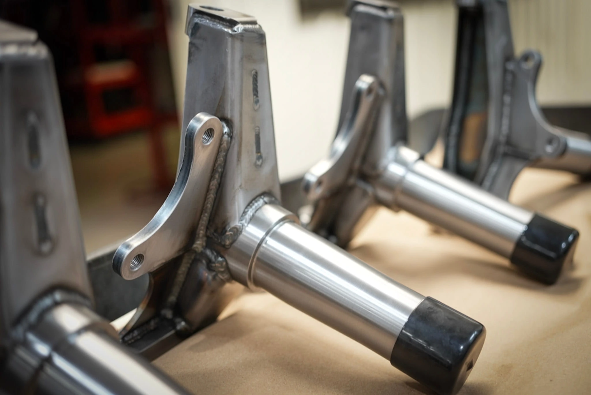 Custom machined suspension and fixture components in an ETG machine shop